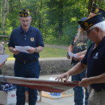 Post 594 Flag Day 2017 - Post 594 and Boy Scouts read the retirement ceremony while a flag is folded. Post 594 Flag Day 2017
