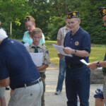 Post 594 Flag Day 2017 - Post 594 and Boy Scouts read the retirement ceremony while a flag is folded. Post 594 Flag Day 2017