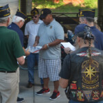 Post 594 Flag Day 2017 - Post 594 and Boy Scouts read the retirement ceremony while a flag is folded. Post 594 Flag Day 2017
