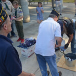 Post 594 Flag Day 2017 - More flags are prepared for burning. Post 594 Flag Day 2017